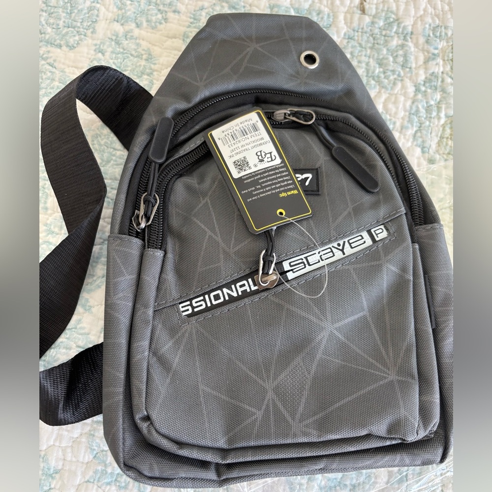 Mountain High crossbody backpack 4 zippered compartments, NWT